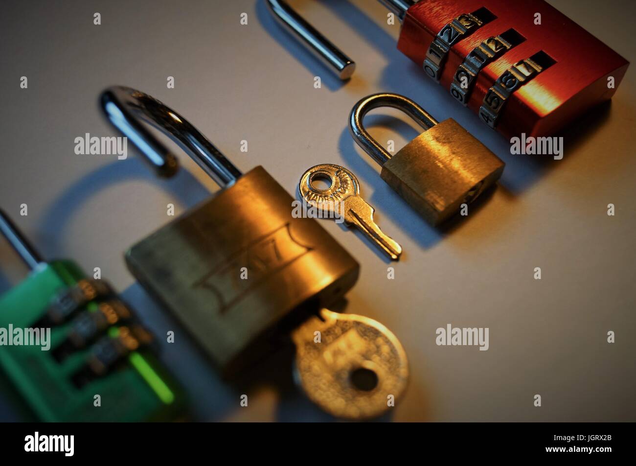 Colourful locks with key Stock Photo