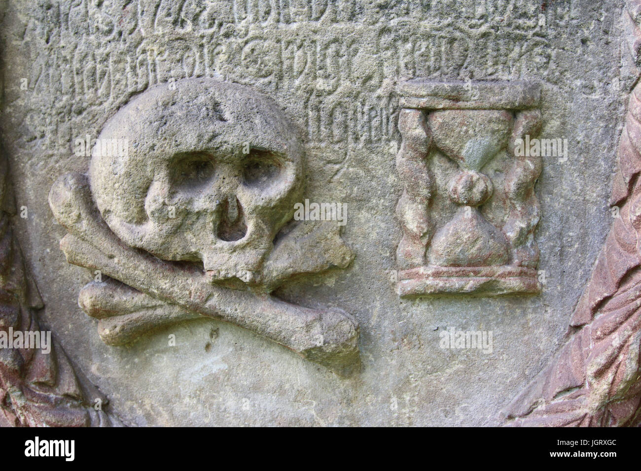 Skull and Hourglass - the symbol of the transience of human life - detail Stock Photo