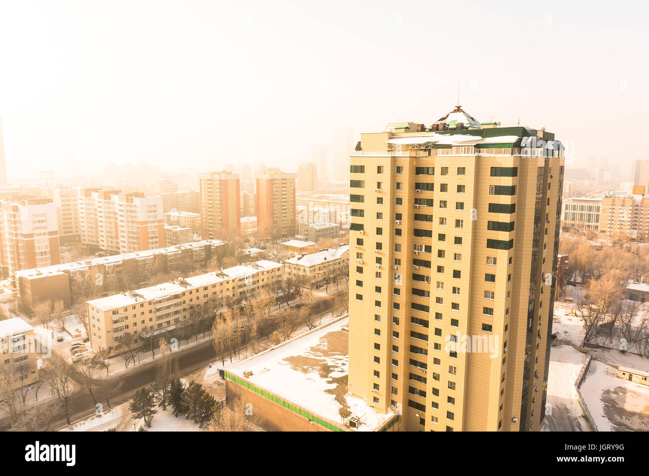 High building in Astana at the background of the city early in the