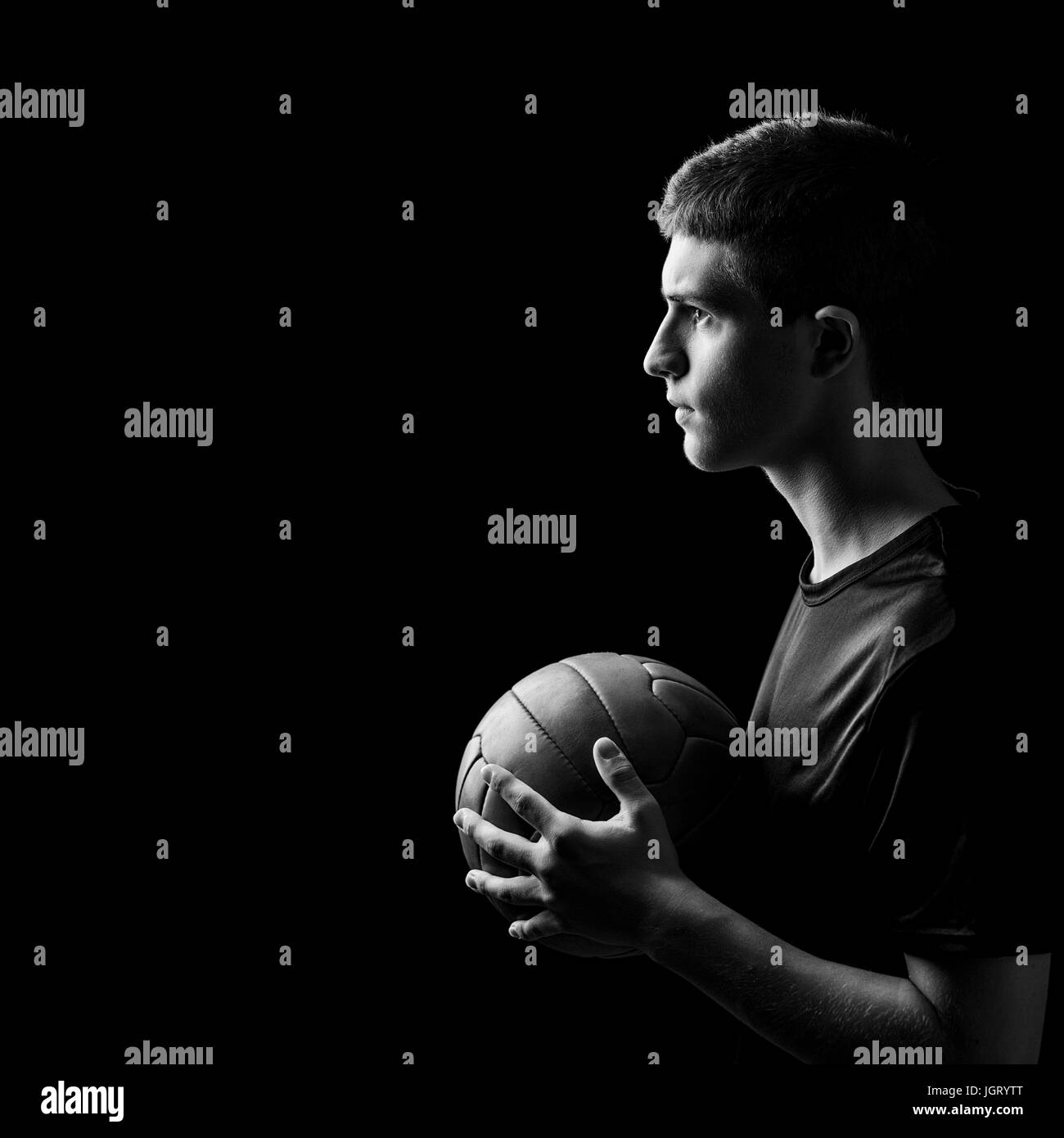 black and white portrait of young soccer player Stock Photo