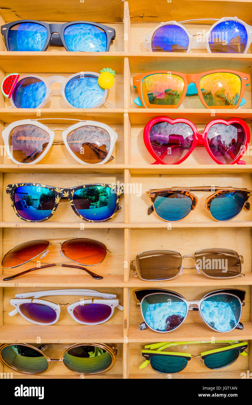 Sunglasses in display case Stock Photo