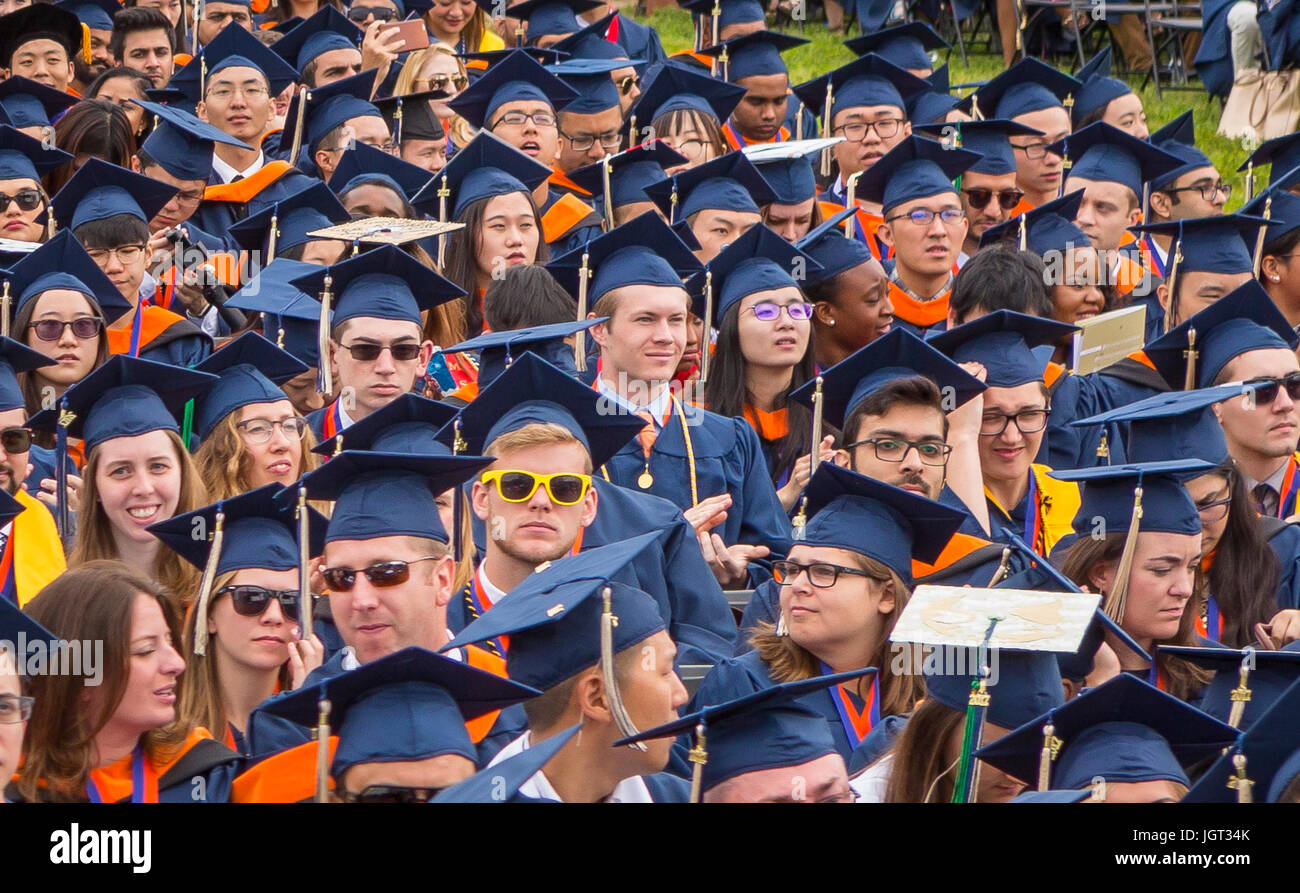 WASHINGTON, DC, USA - College graduates in cap and gown at George Washington University commencement. Stock Photo