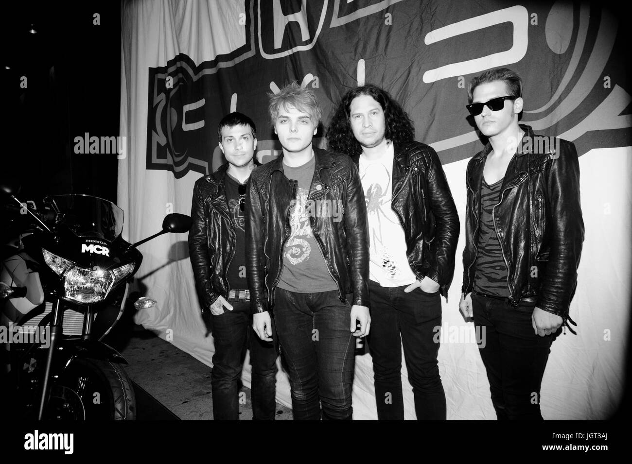 (L-R) Frank Iero,Gerard Way,Ray Toro Mikey Way My Chemical Romance pose infront custom motorcycle for blink-182 My Chemical Romance 2011 Honda Civic Tour Announcement Event Rainbow Bar & Grill May 23,2011 Los Angeles,California. Stock Photo