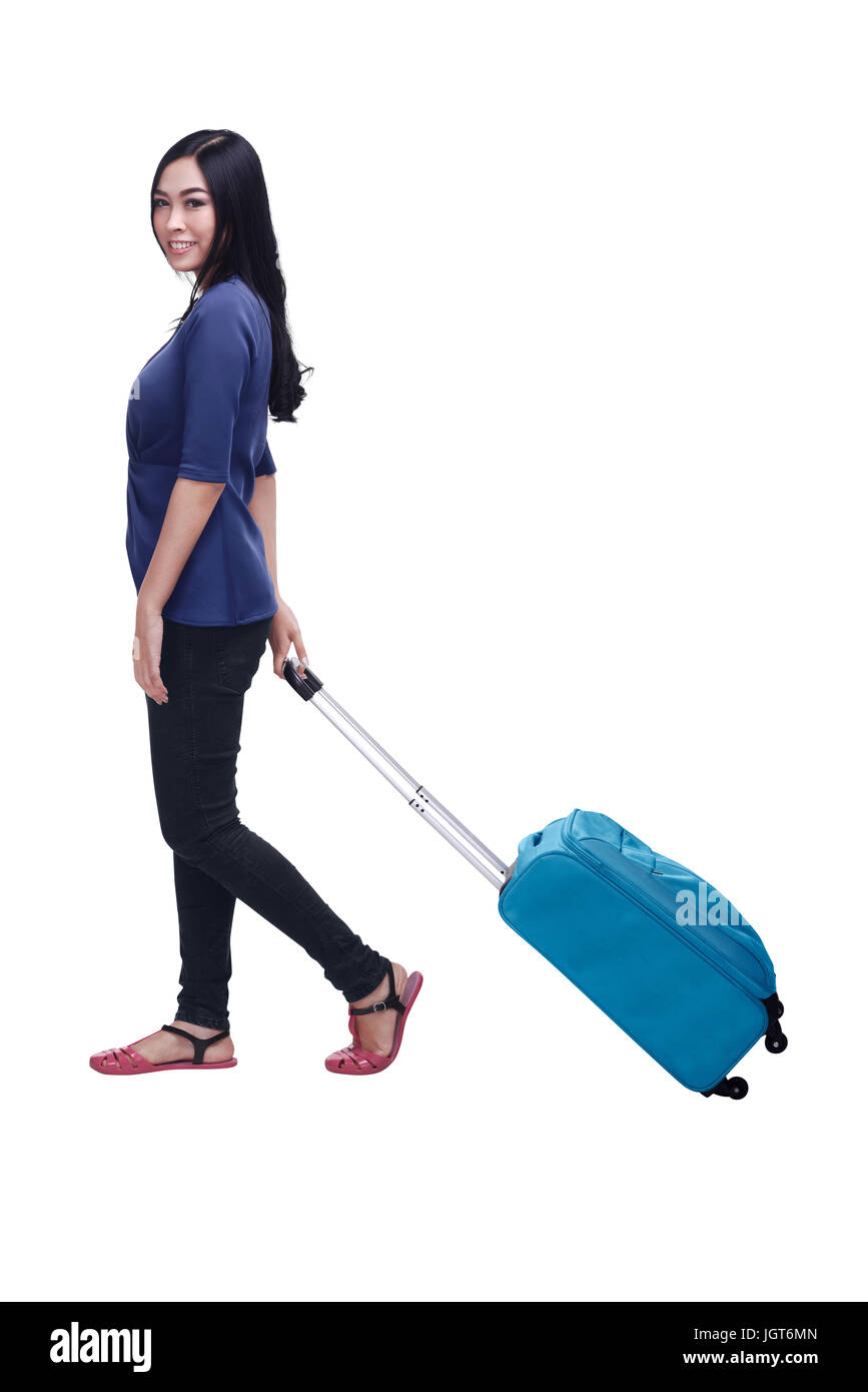Beautiful asian woman going trip with suitcase isolated over white background Stock Photo