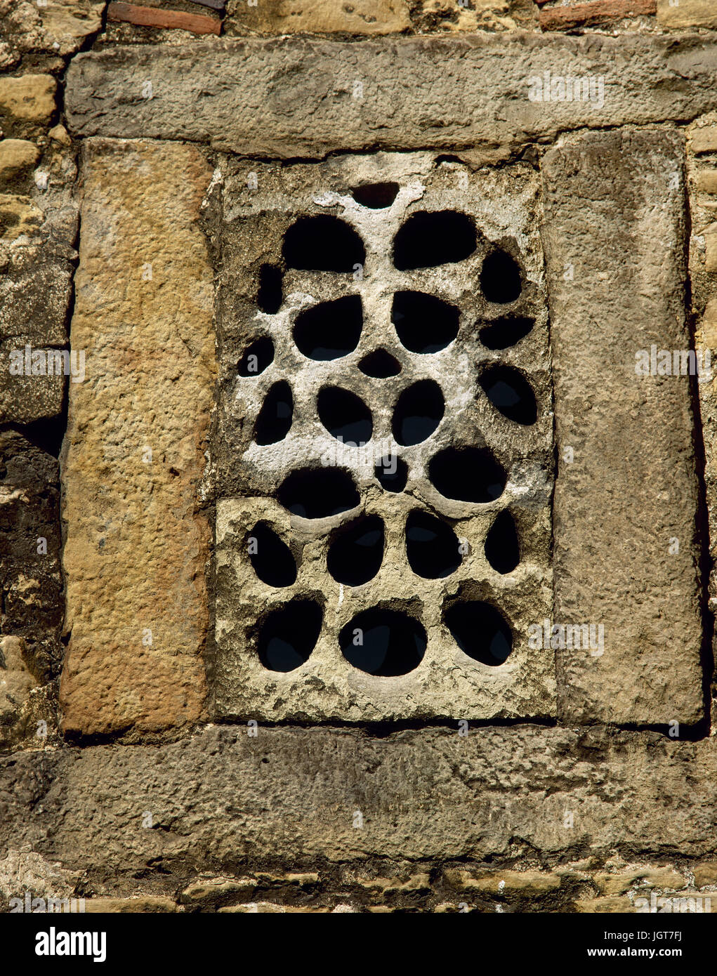 San Julian de los Prados or Santullano. Pre-Ramirense.  Asturian pre-Romanesque. 9th century. Original window. Spain. Stock Photo