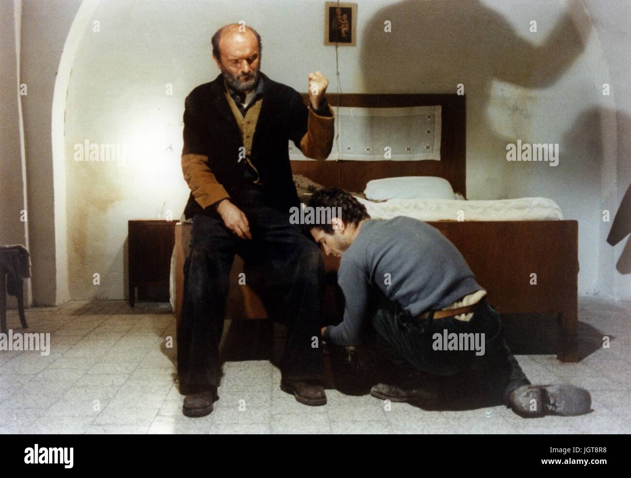 Padre padrone   Year : 1977 Italie  Director : Paolo Taviani  Omero Antonutti, Saverio Marconi    Palme d'or Cannes 1977   Photo: Umberto Montiroli.  It is forbidden to reproduce the photograph out of context of the promotion of the film. It must be credited to the Film Company and/or the photographer assigned by or authorized by/allowed on the set by the Film Company. Restricted to Editorial Use. Photo12 does not grant publicity rights of the persons represented. Stock Photo