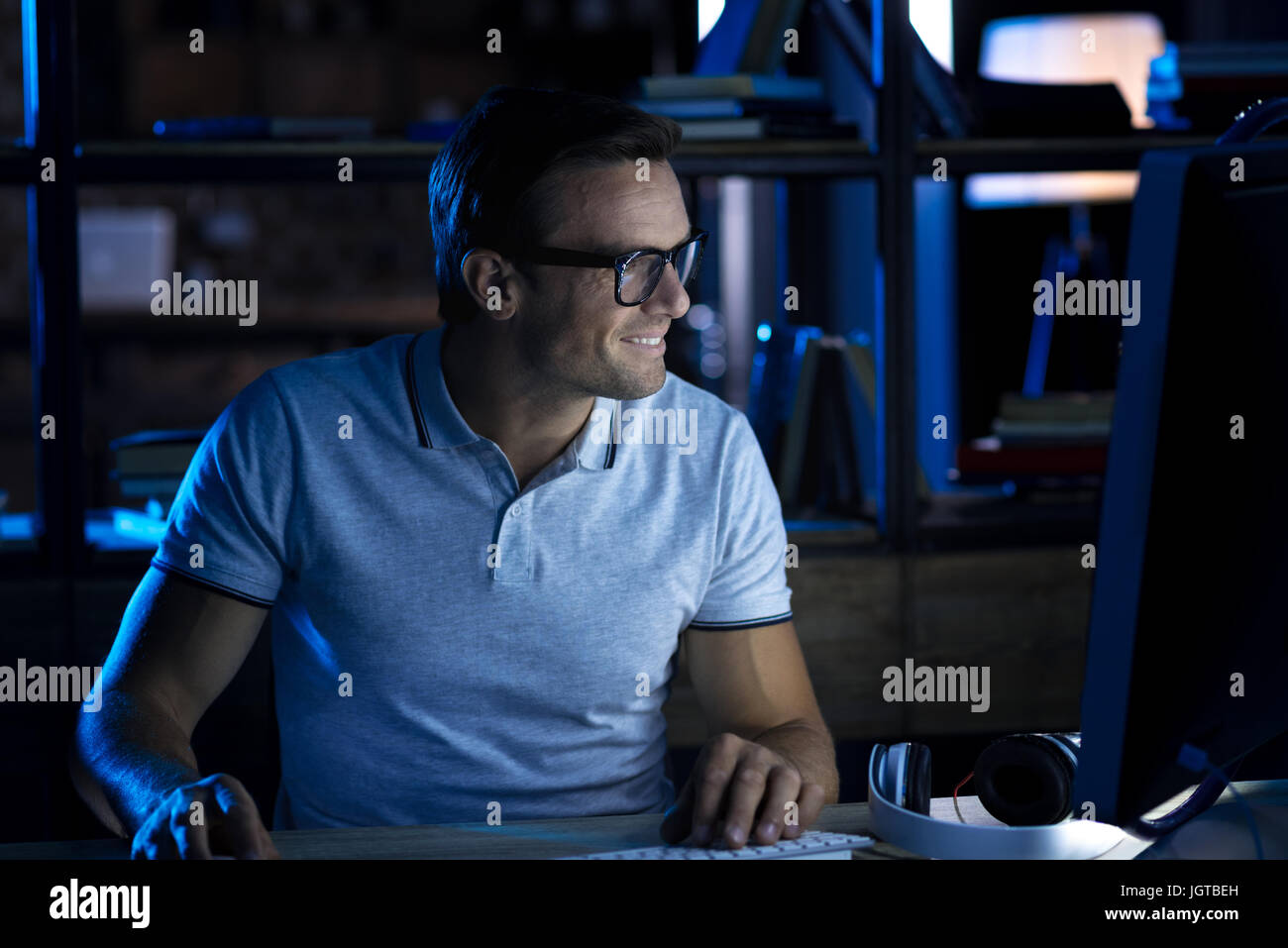 Progressive hardworking man completing the reports Stock Photo