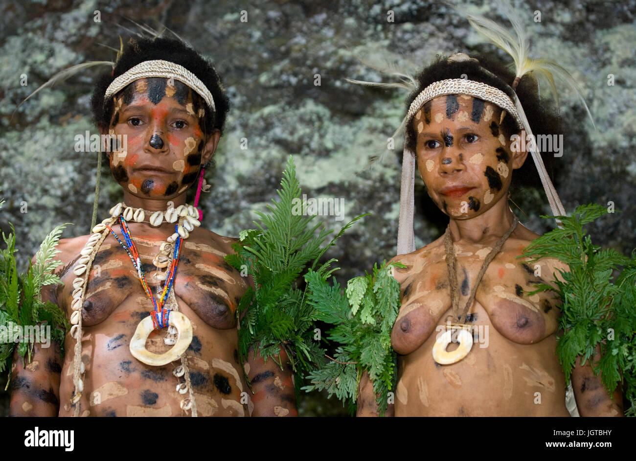 NEW GUINEA, INDONESIA - 13 JANUARY: Women Yaffi tribe in traditional coloring. Stock Photo
