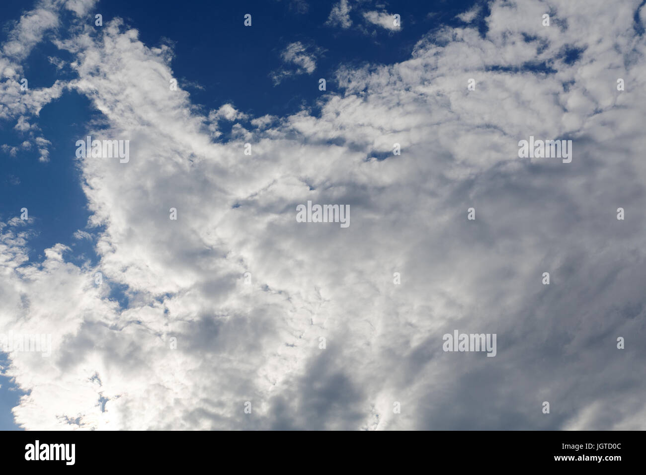 stratocumulus clouds and the dark blue sky Stock Photo