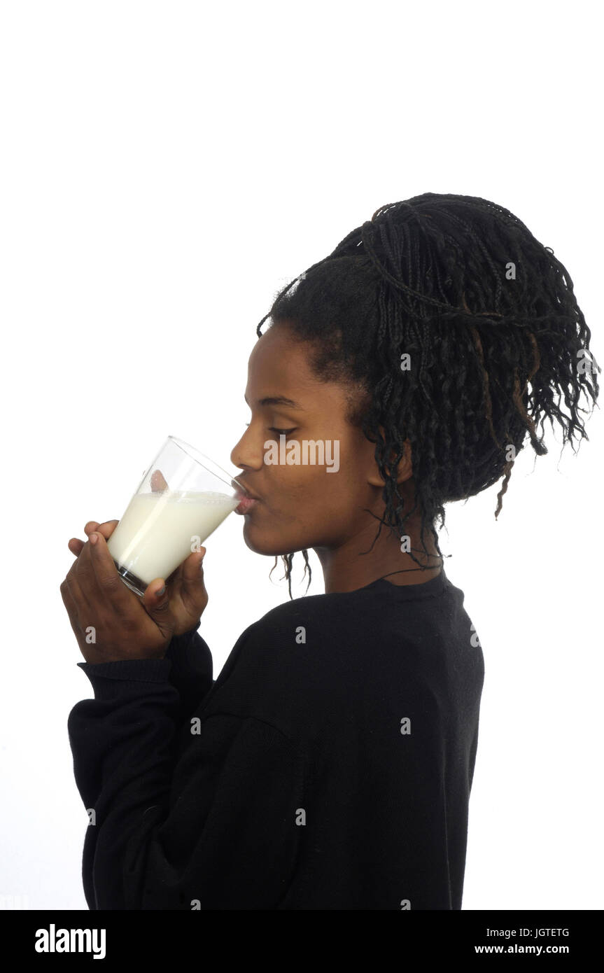 teenage girl drinking milk Stock Photo