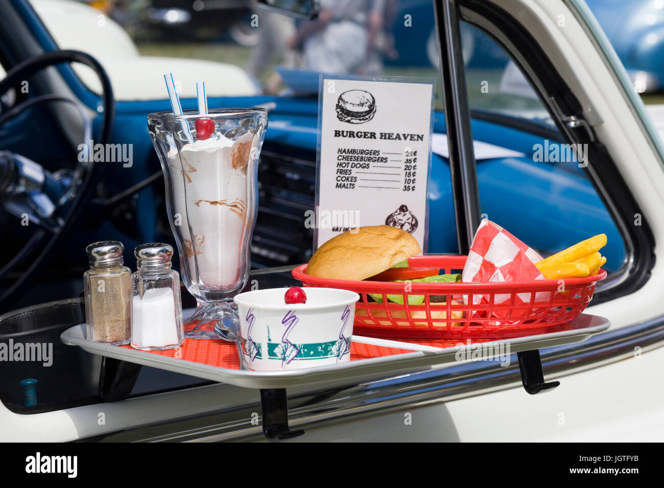 Fast food on hanging window tray at drive-in Stock Photo