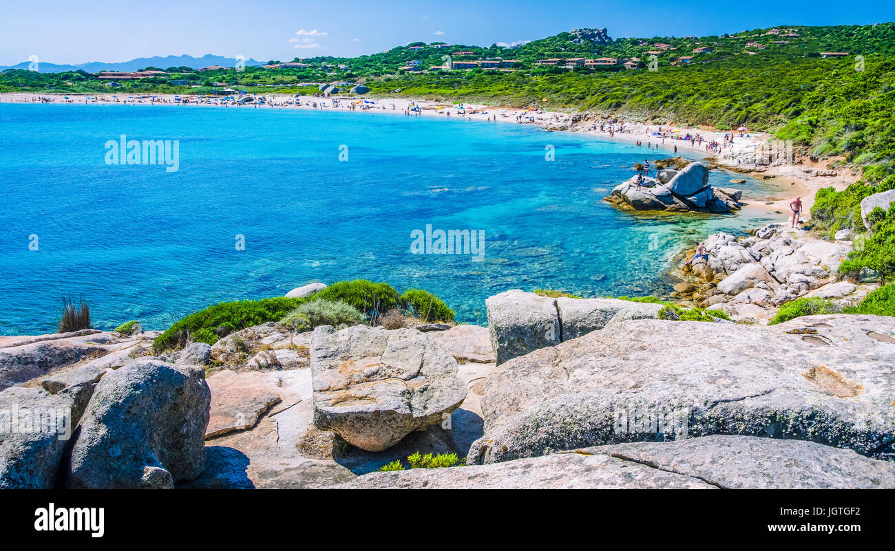 Azure beach full tourist at Porto Pollo on beautiful Sardinia island Sardinia, Italy Stock Photo