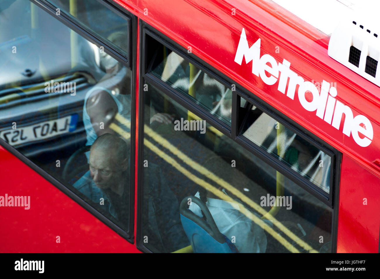 Passengers on a Metroline TFL bus in London, UK Stock Photo