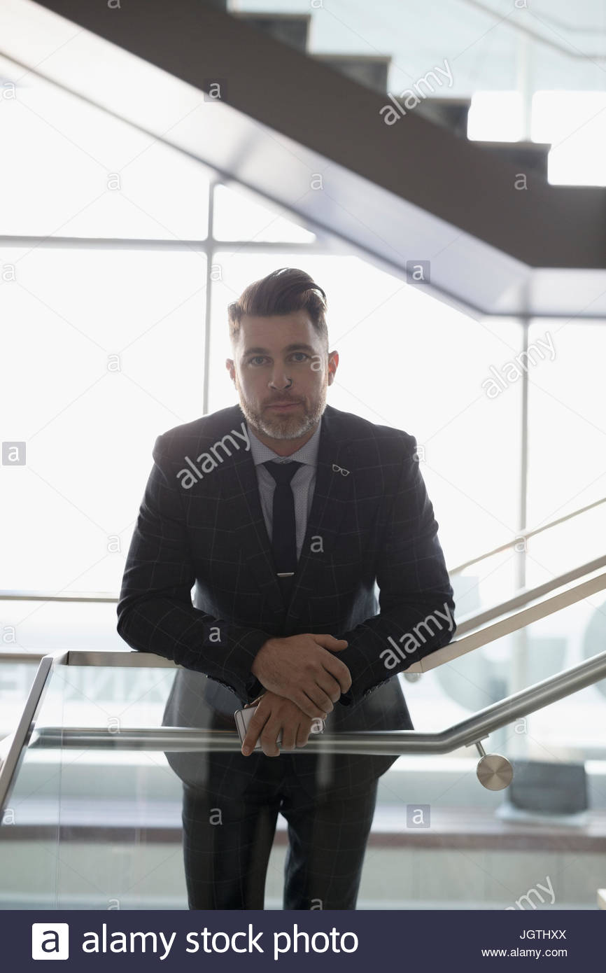 Man leaning on a railing hi-res stock photography and images - Alamy