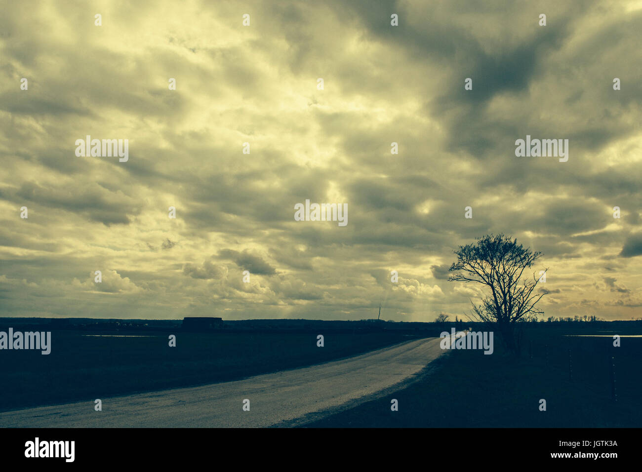 Stormy sky and asphalt road Stock Photo - Alamy