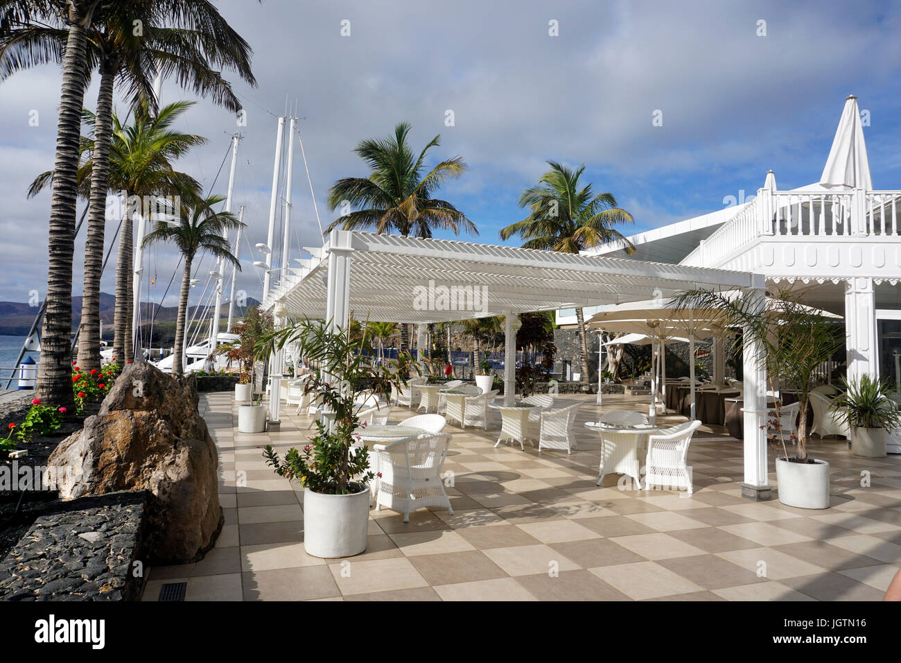 Chic restaurant at Yacht harbour of Puerto Calero, Lanzarote island, Canary islands, Spain, Europe Stock Photo