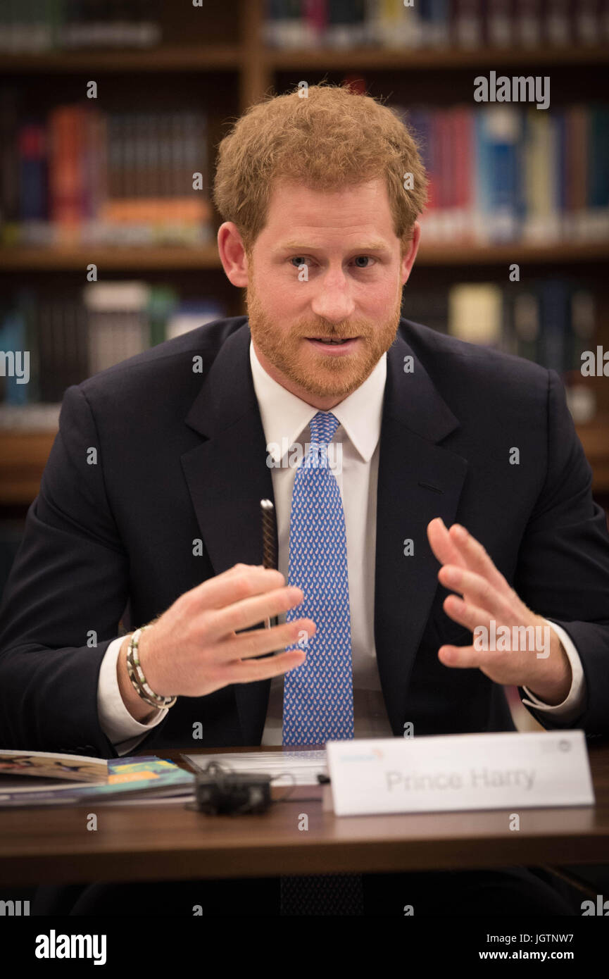 Prince Harry meets staff during a visit to the London School of Hygiene and Tropical Medicine in Bloomsbury, London where he saw the work being undertaken to combat some of the world's most pressing health issues. Stock Photo