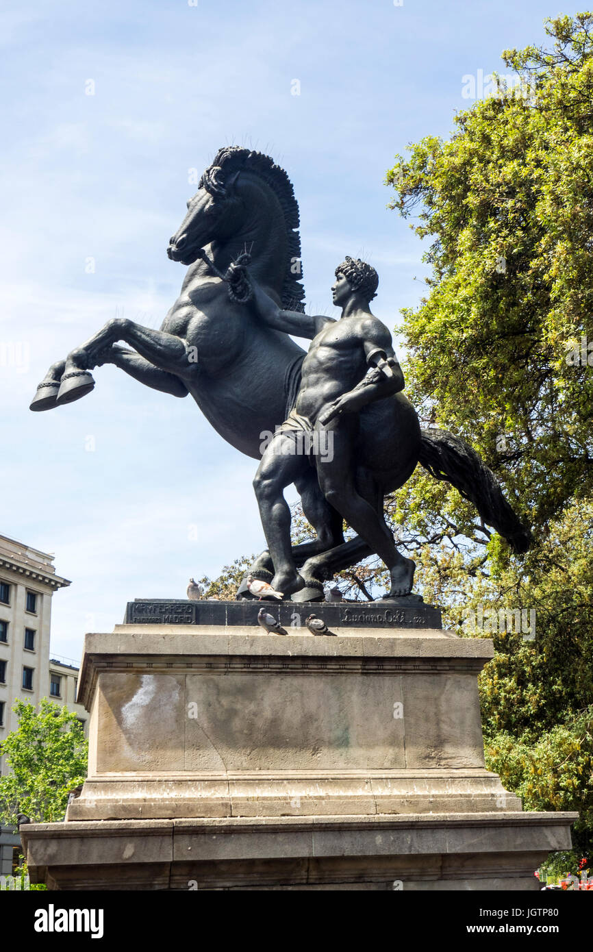 Bronze equestrian sculpture, Treball, by Llucià Oslé at Plaça de Catalunya, Barcelona, Spain. Stock Photo