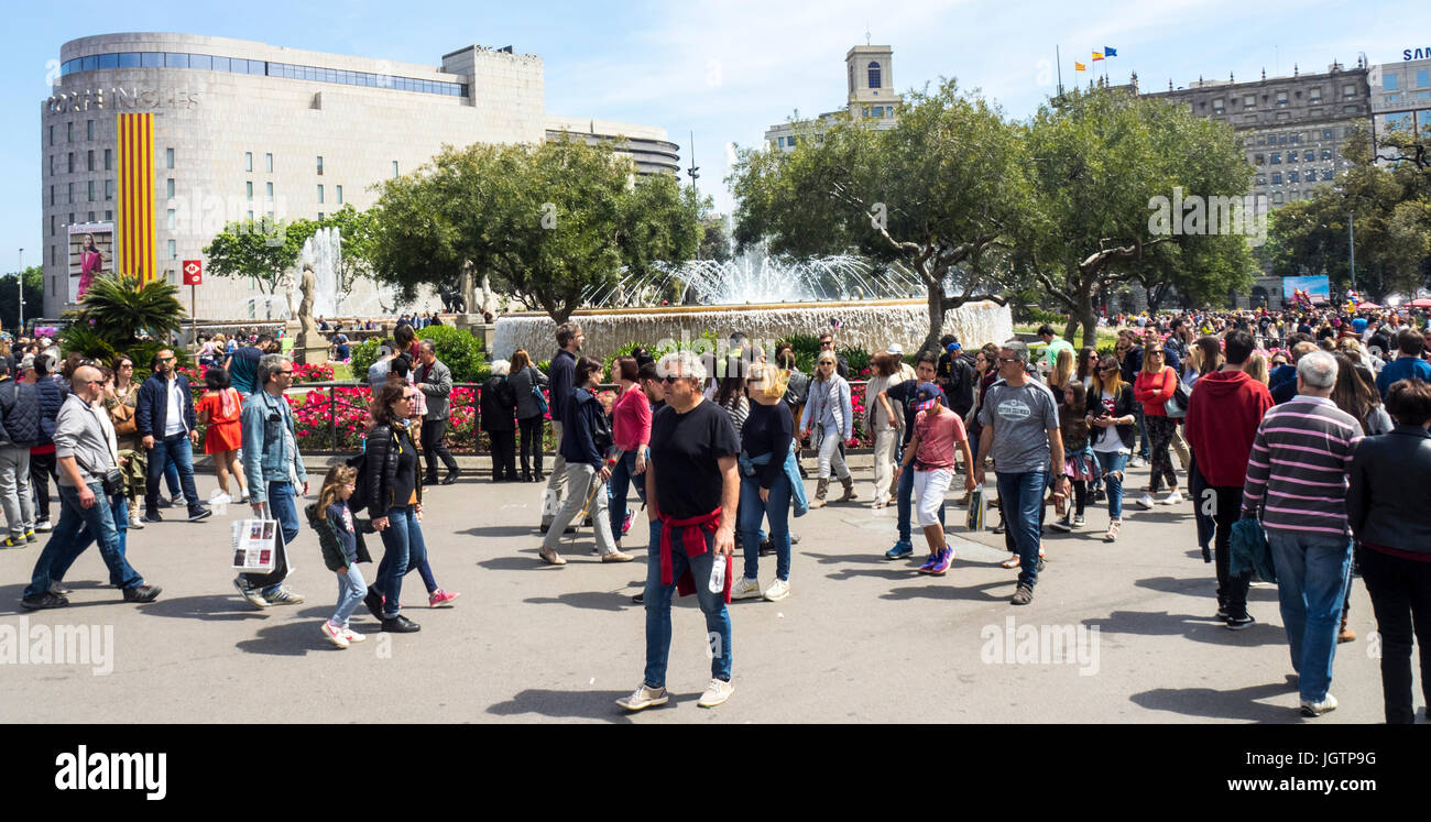 Crowds of people walking in Placa de Catalunya on Sant Jordi Day, Barcelona, Spain. Stock Photo