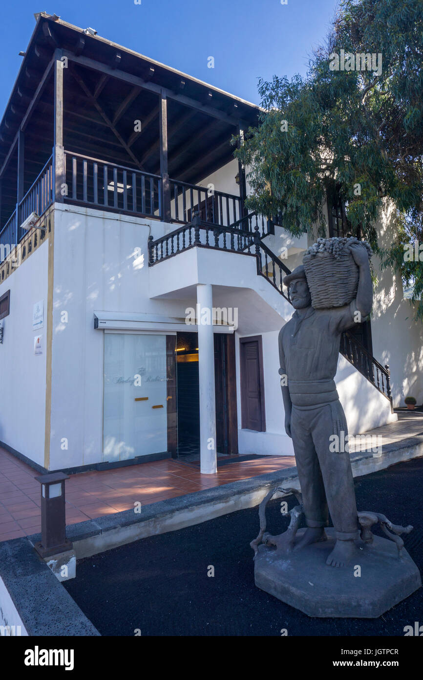 Vintner sculpture at Bodega Rubicon, vineyard at La Geria, Lanzarote