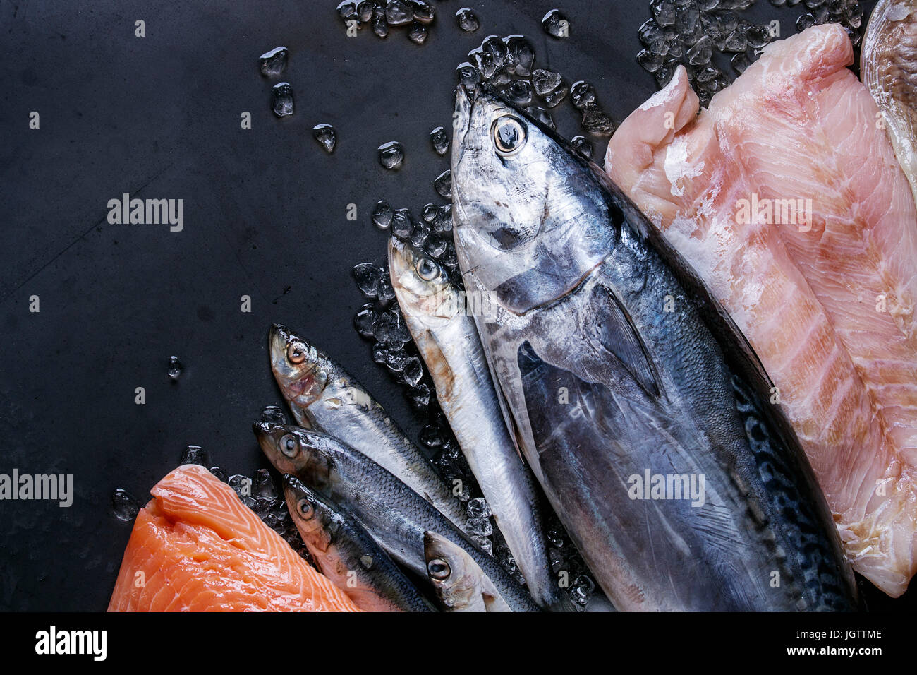 Raw Fish Innards Variety of raw fresh fish. Whole tuna and herring, fillet of salmon ...