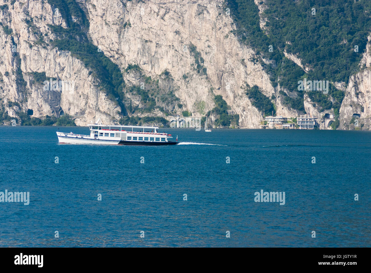 Ferry boat leaving Riva del Garda, Garda lake, Trentino Alto Adige Italy Stock Photo