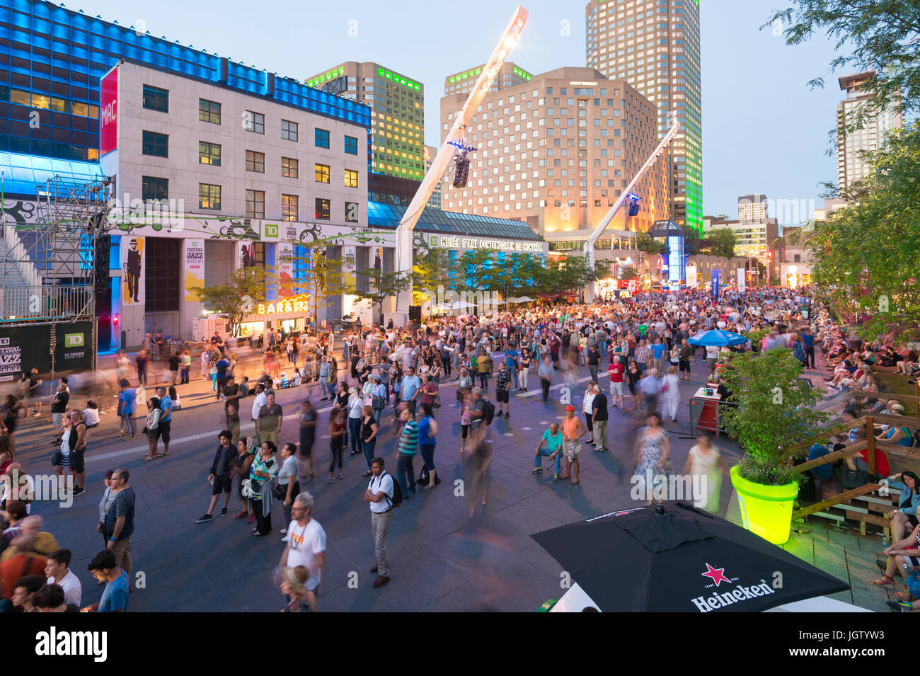 Montreal, Canada - 5 July 2017: People gathering at Place des Festivals to attend a music concert at the Montreal Jazz Festival. Stock Photo