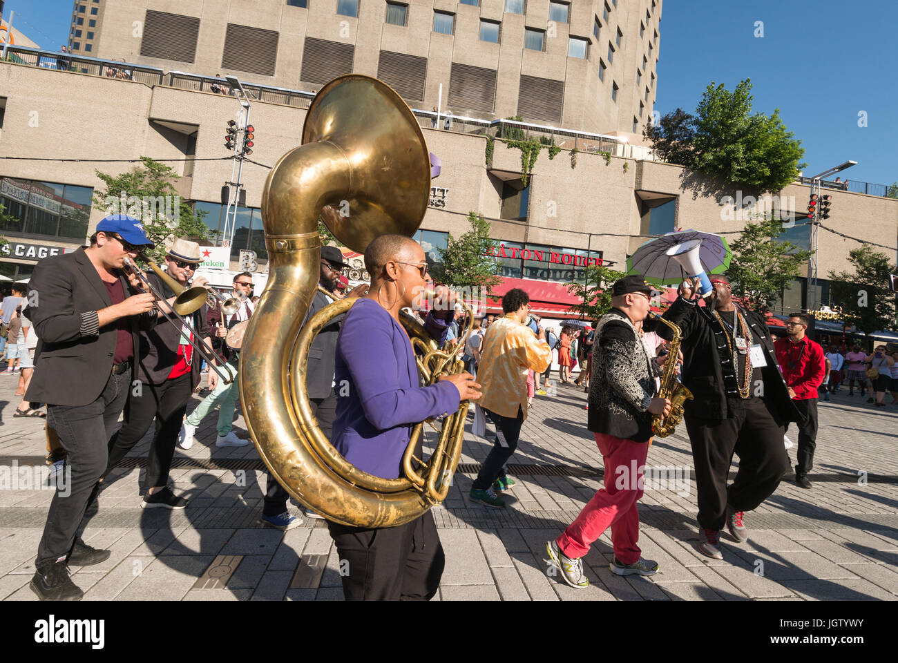 Montreal, 8 July 2017: Julie Richard from Urban Science Brass Band playing the Sousaphone at the Montreal Jazz Festival Stock Photo