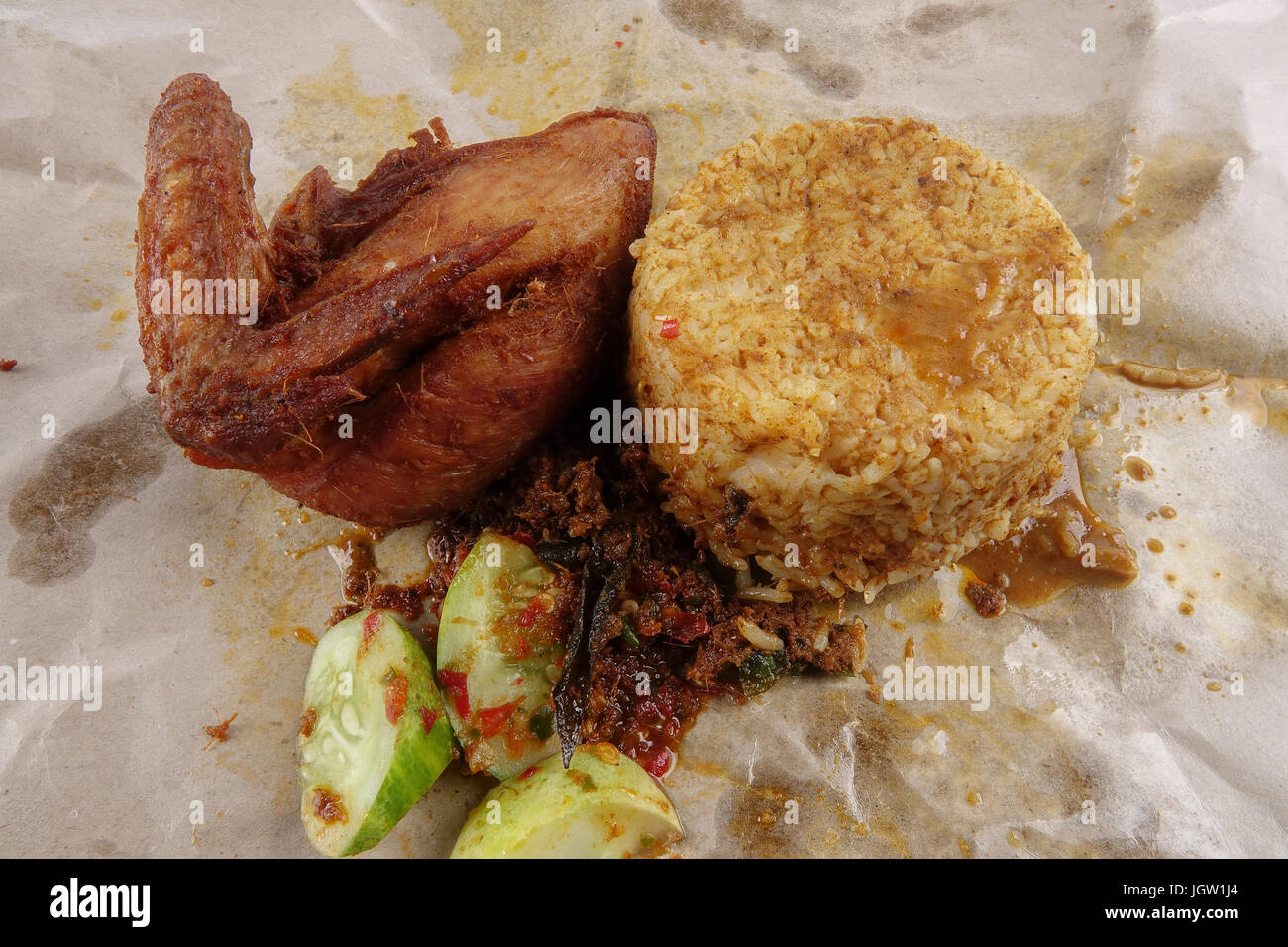 Traditional steam rice with curry and fried chicken Stock Photo Alamy