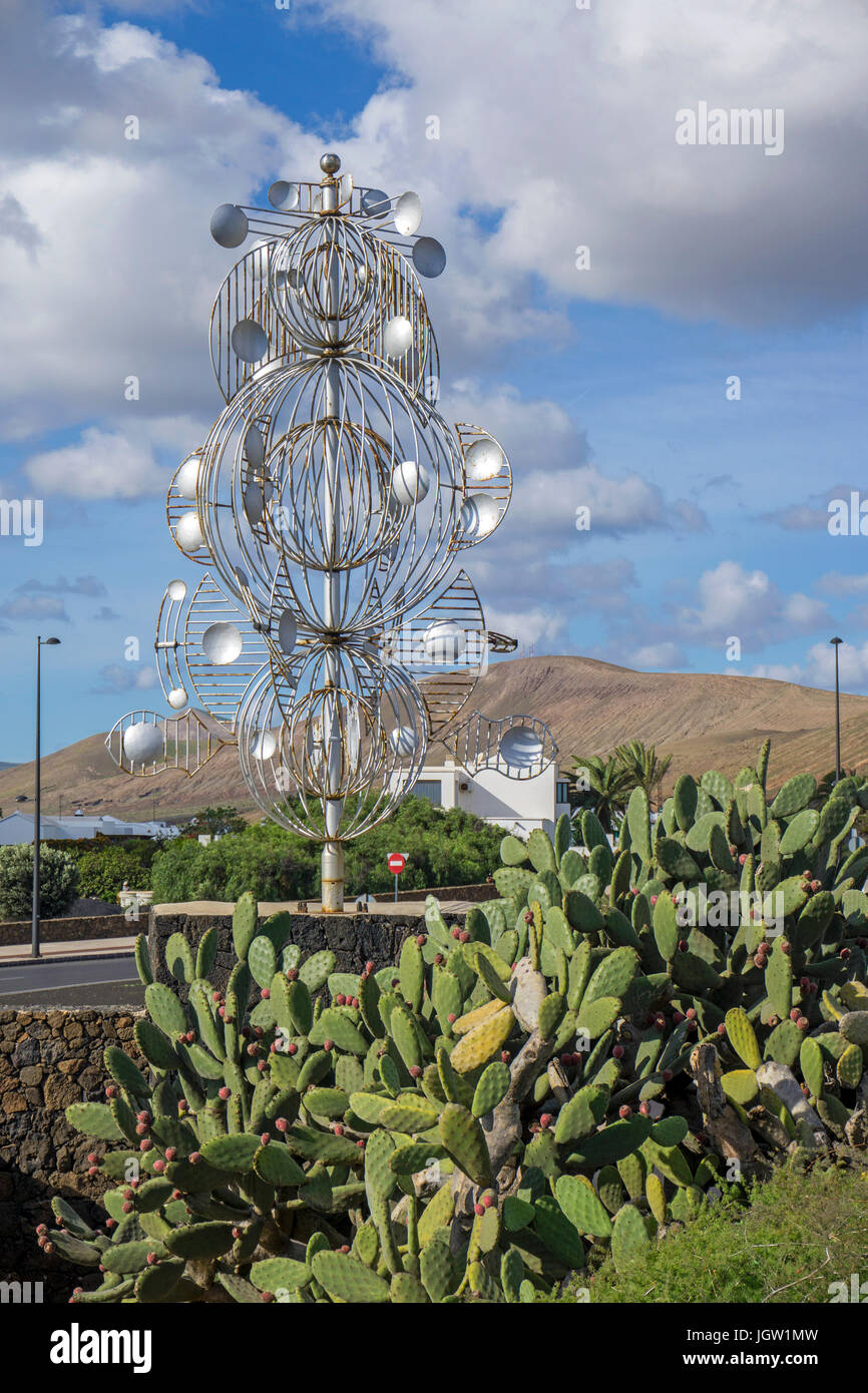 Silver wind chime, sculpture at a crossroad, exit to Fundacion Cesar Manrique, Tahiche, Lanzarote island, Canary islands, Spain, Europe Stock Photo