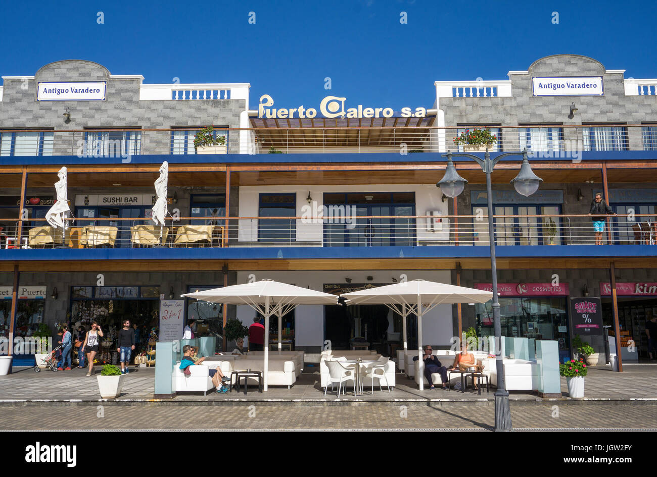 Coffee shop and shops at the harbour promenade, Yacht harbour, Puerto Calero, Lanzarote island, Canary islands, Spain, Europe Stock Photo