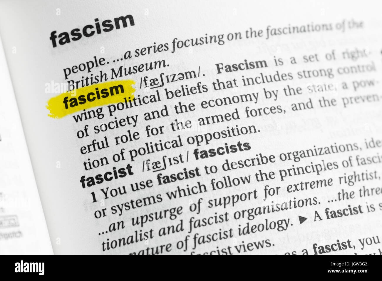 Highlighted English word 'fascism' and its definition at the dictionary. Stock Photo
