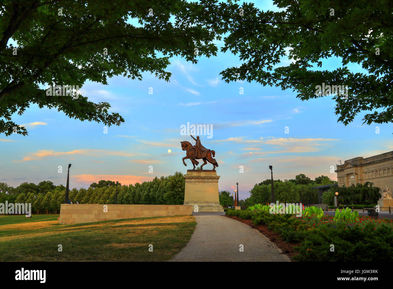 The moon over the Apotheosis of St. Louis statue of King Louis IX of France, namesake of St. Louis, Missouri in Forest Park, St. Louis, Missouri. Stock Photo