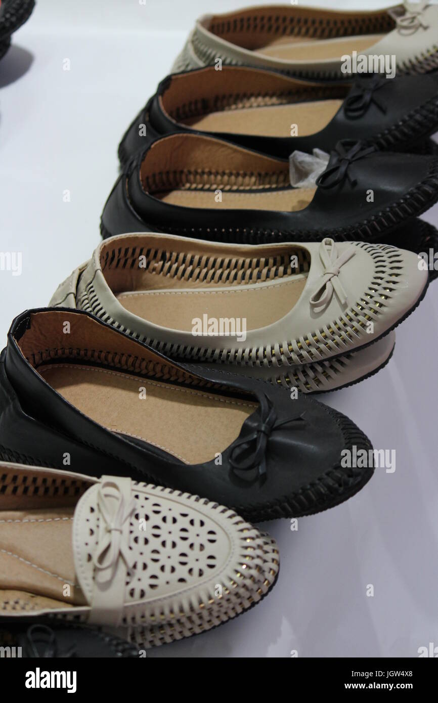 https://c8.alamy.com/comp/JGW4X8/ladies-footwear-from-agra-on-display-for-sale-at-dilli-haat-pitampura-JGW4X8.jpg