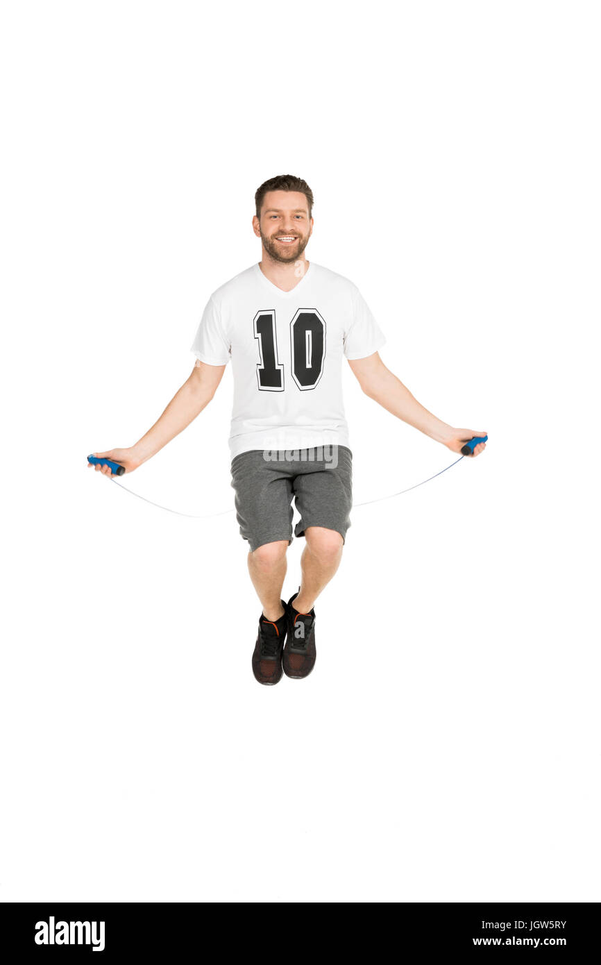 active man jumping with skipping rope isolated on white Stock Photo