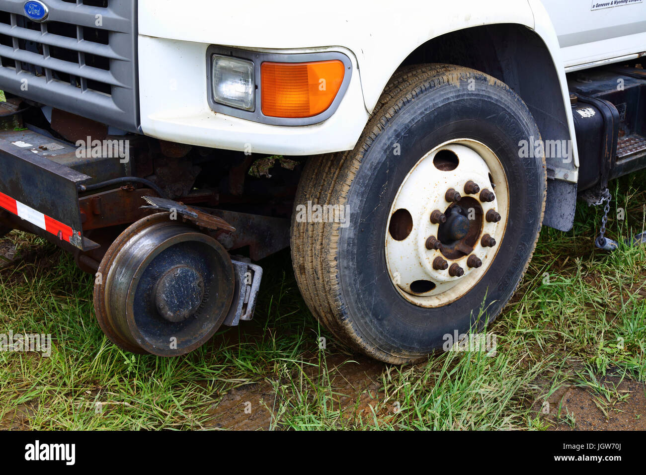 Detail of additional flanged steel wheel on front of Ford road–rail vehicle used by Maryland Midland Railway, Maryland, USA Stock Photo