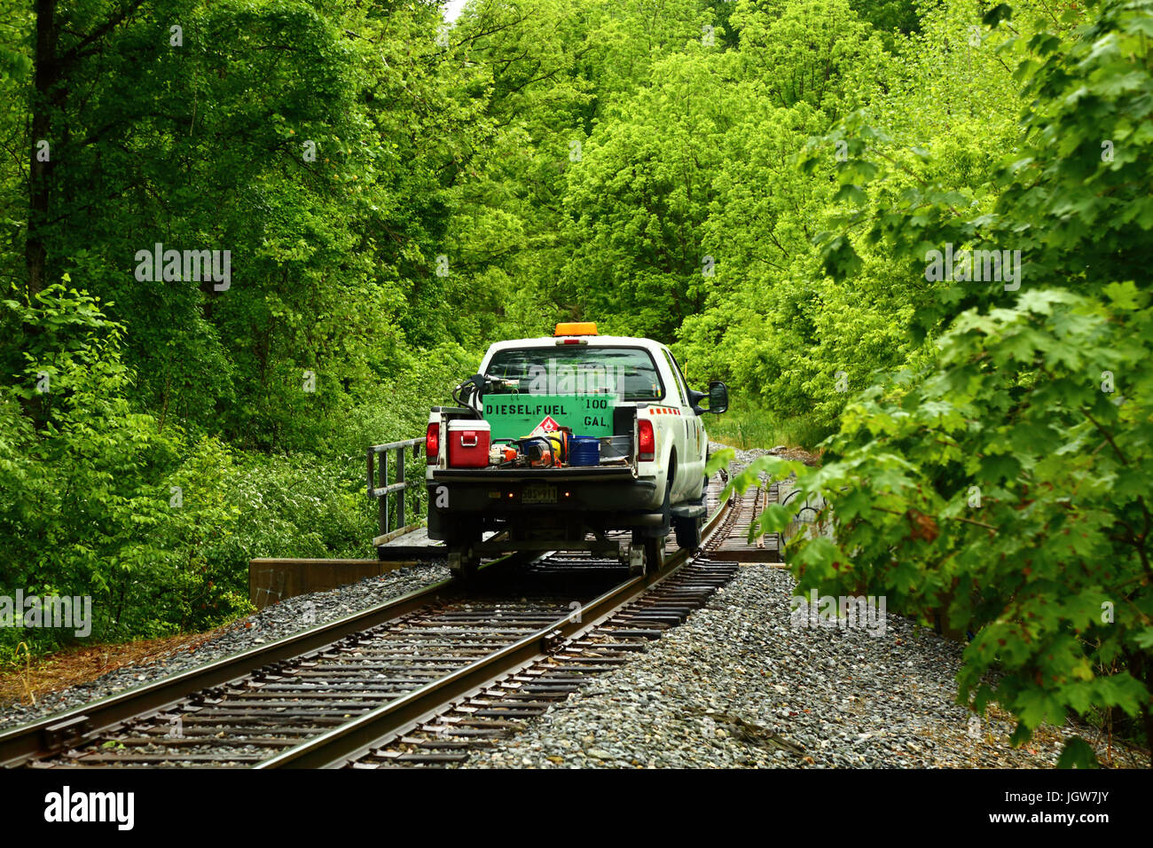 Road–rail vehicle used by Maryland Midland Railway for maintenance on a single track section near Finksburg, Maryland, USA Stock Photo