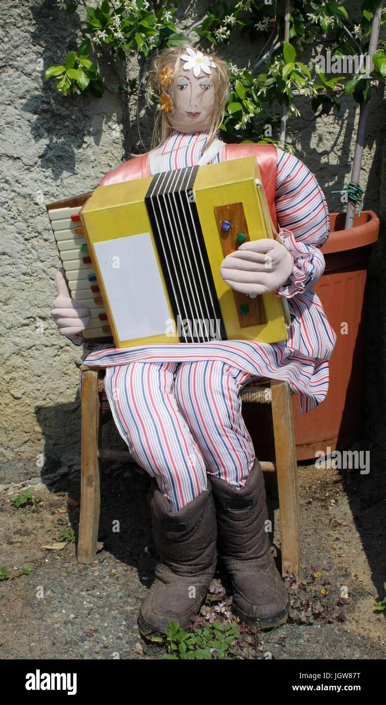 Puppets in Monferrato country, Piedmont, Italy, Hippie woman with accordion Stock Photo