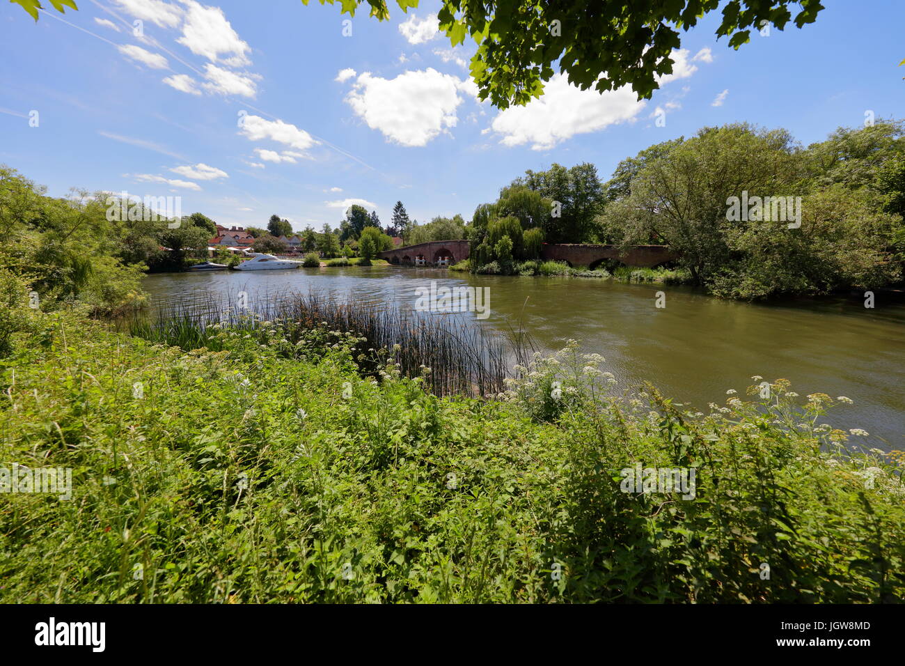 A day out at the River at Sonning a quiet village sat on the banks of the Thames on the Berkshire side with a party going on in the hotel grounds. Stock Photo