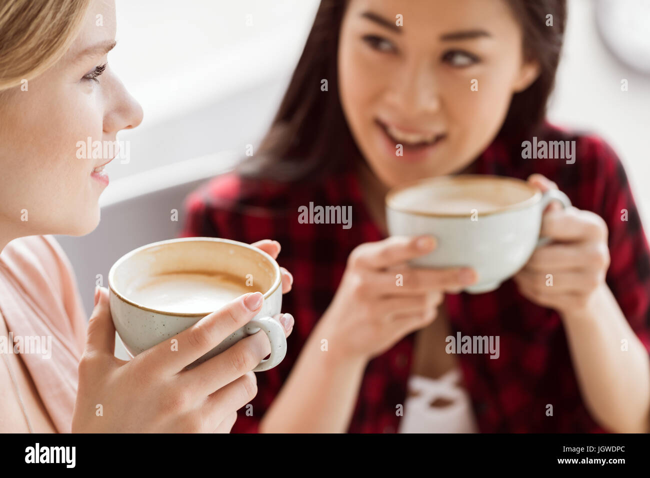 friends spend time together on coffee break in cafe Stock Photo Alamy