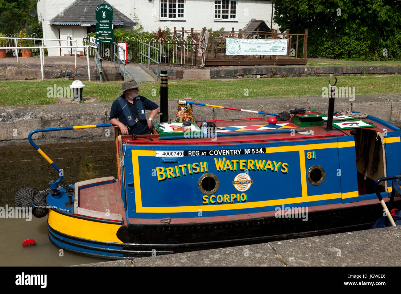 Traditional narrowboat 'Scorpio' at Calcutt Locks, Grand Union Canal, Warwickshire, England, UK Stock Photo