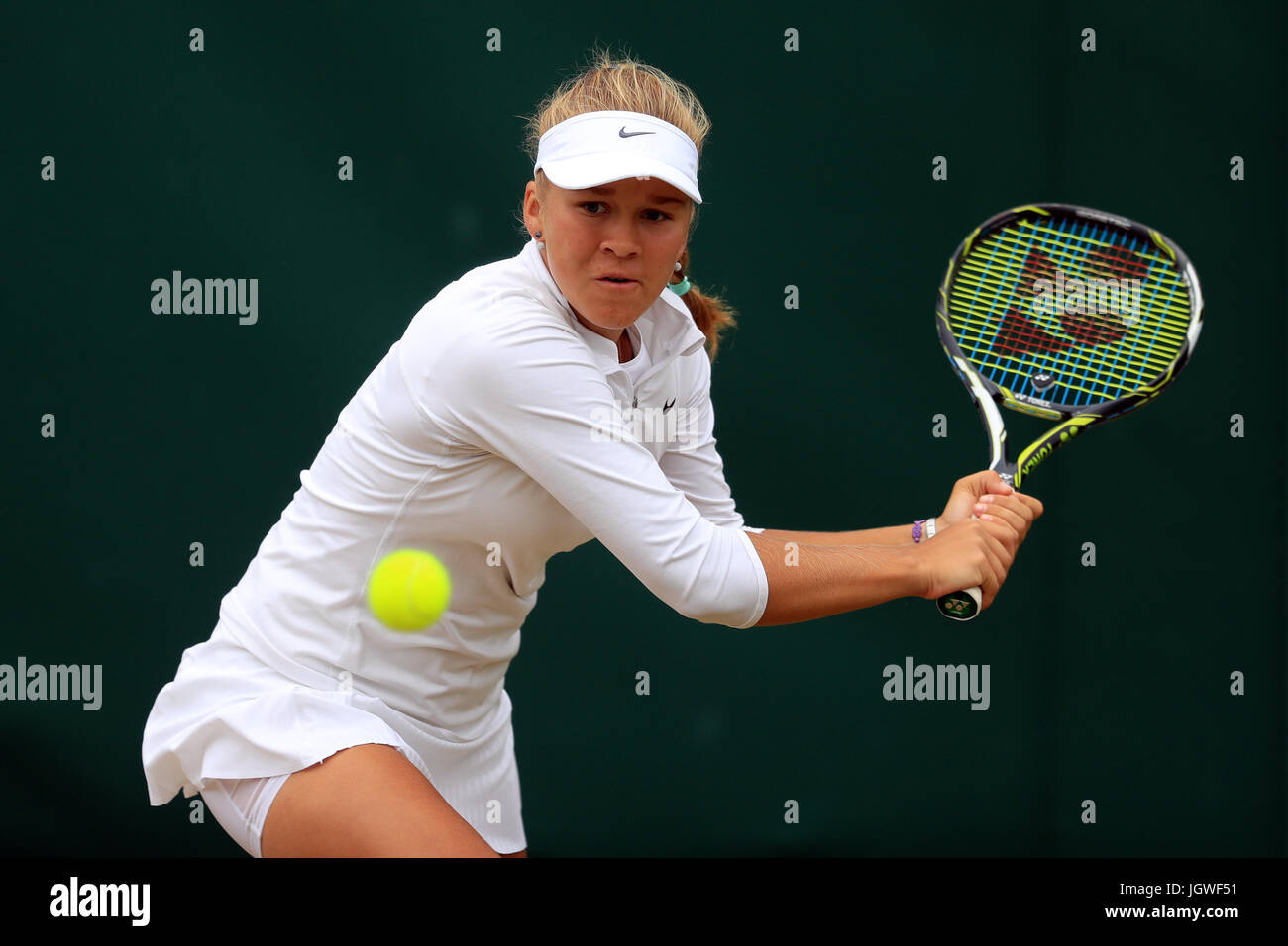 Sofya Lansere in action during the girls singles on day eight of the  Wimbledon Championships at The All England Lawn Tennis and Croquet Club,  Wimbledon Stock Photo - Alamy