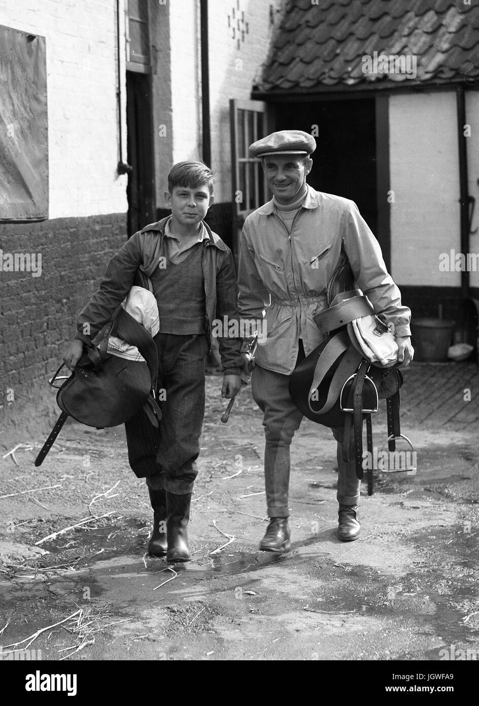 Jockey and stable lad at racing stables Britain 1950s Stock Photo