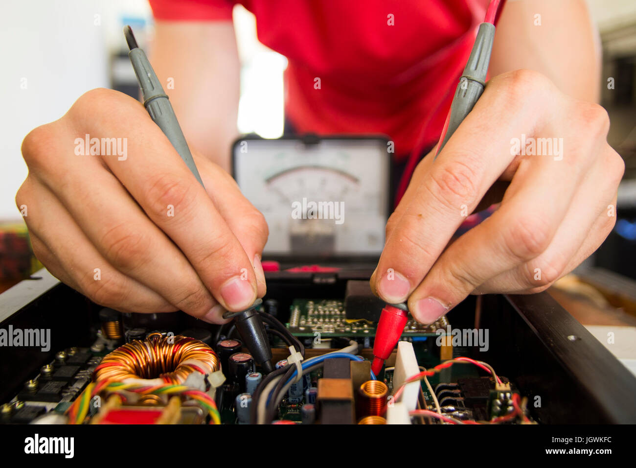 REPAIRING ELECTRONICS WITH TEST EQUIPMENT Stock Photo Alamy