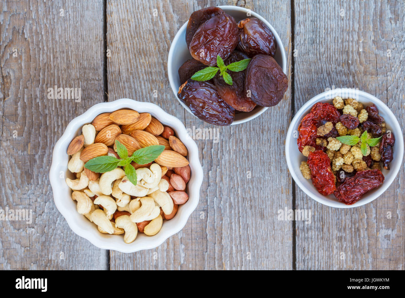 Different types of nuts and dried fruits. Healthy dietary snack, dried