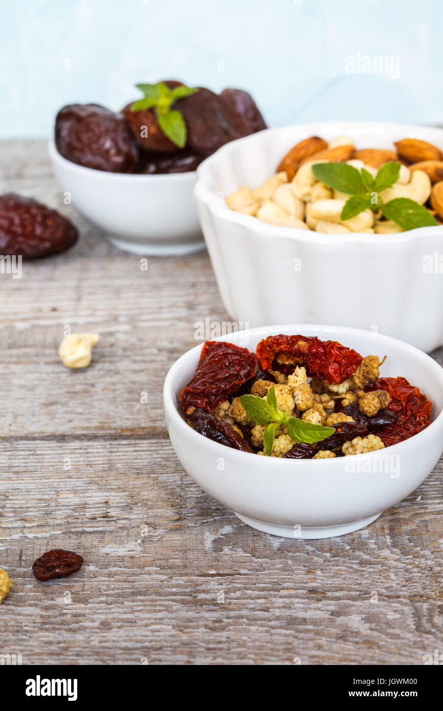 Different types of nuts and dried fruits. Healthy dietary snack, dried