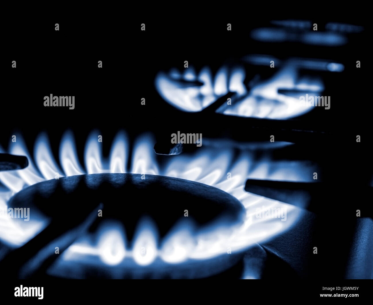 Household gas oven stove with the gas flame on fire Stock Photo Alamy