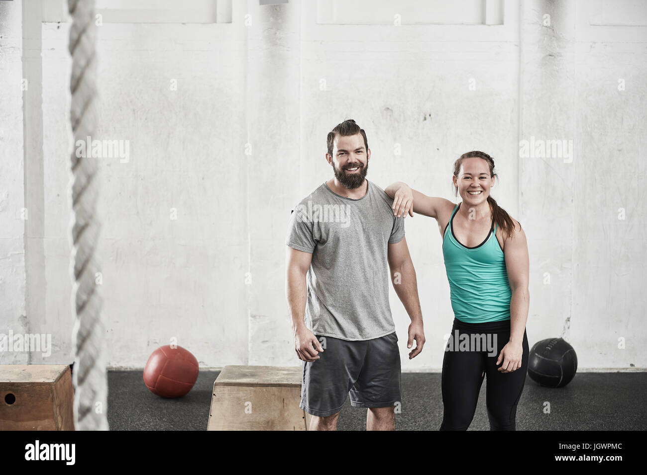 Couple in cross training gym Stock Photo