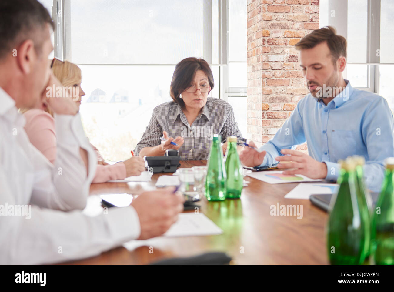 Colleagues having discussion in business meeting Stock Photo