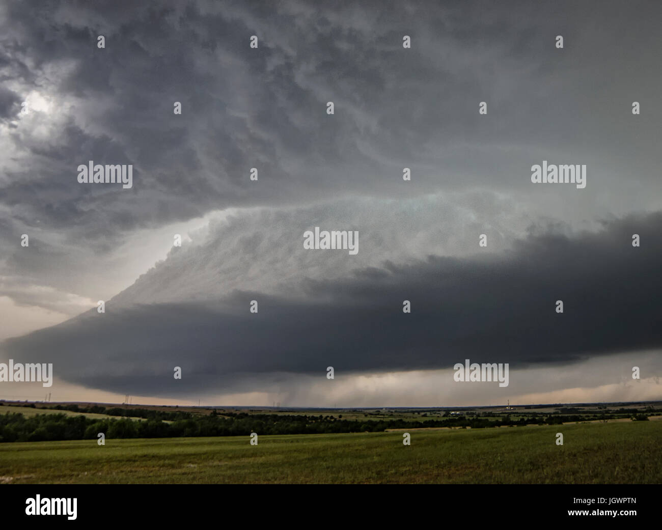 Bell shaped updraft of rotating supercell over rural area, Chester, Oklahoma, United States, North America Stock Photo